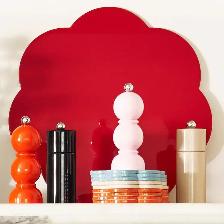 Plusieurs petits produits colorés Addison Ross dont le Bobbin Rose
