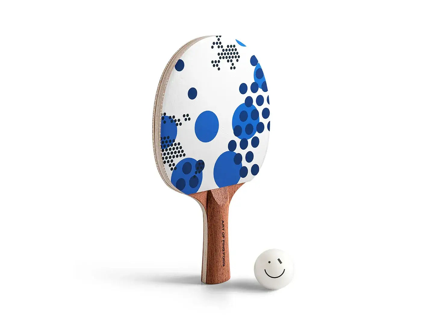 Raquette de ping-pong Triple Spot RÆBURN au motif graphique bleu avec balle Smiley