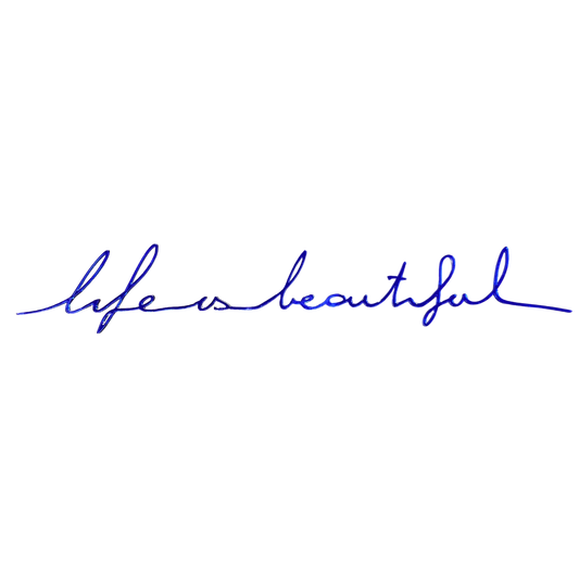 Décoration murale Life is Beautiful de chez Atelier Suspendu visuel du message accroché