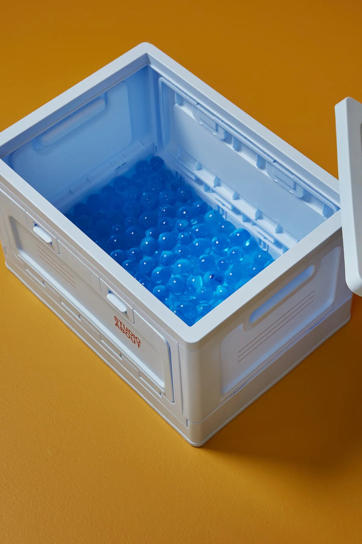 BOX Bleu clair Studio About ouverte avec accès par le dessus