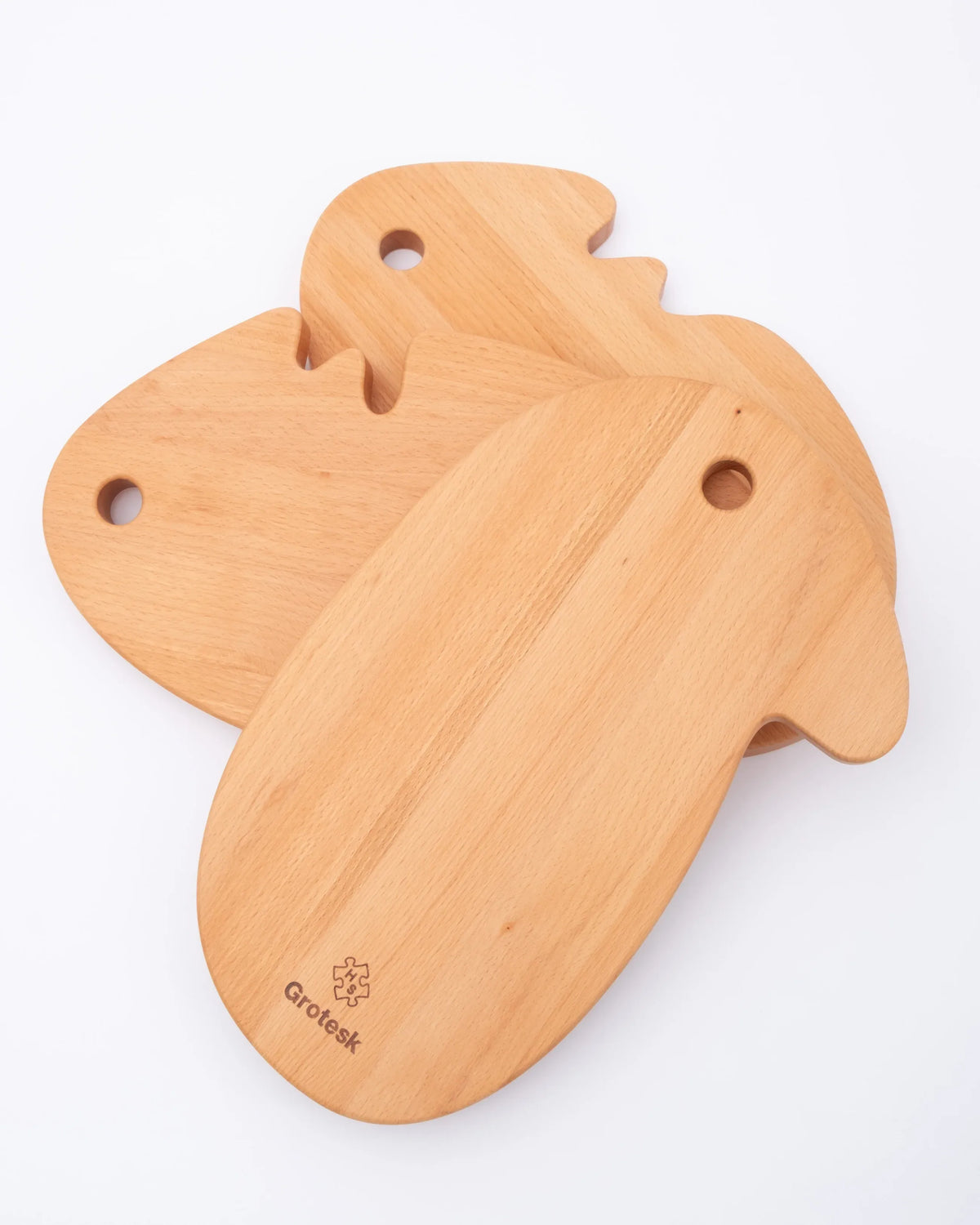 Cheese Head : 3 modèles de planches en bois de hêtre découpées en forme de visage par Grotesk pour Home Studyo