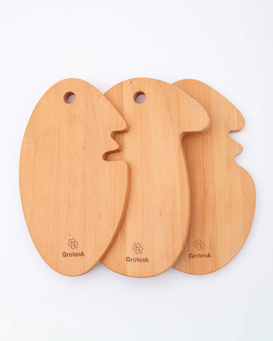 Cheese Head : 3 modèles de planches en bois de hêtre découpées en forme de visage par Grotesk pour Home Studyo