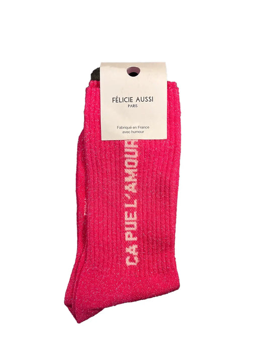 Chaussette paillettes Félicie rose avec message « Ça pue l'amour » écrit en blanc