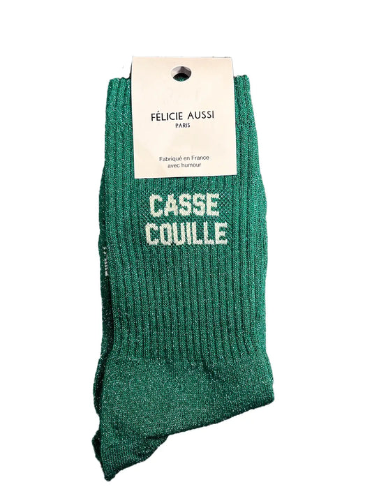 Chaussette Félicie cousue en coton, verte à paillettes avec « Casse couille » écris en blanc