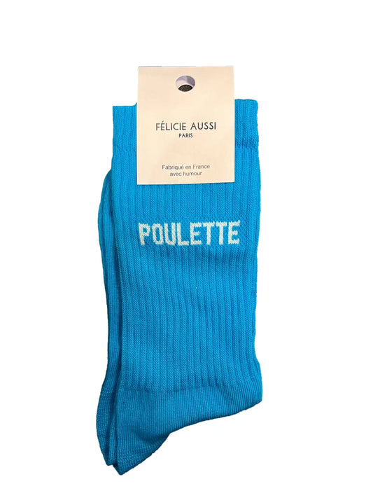 Chaussette Félicie cousue en coton, bleue à paillettes avec « Poulette » écris en blanc.