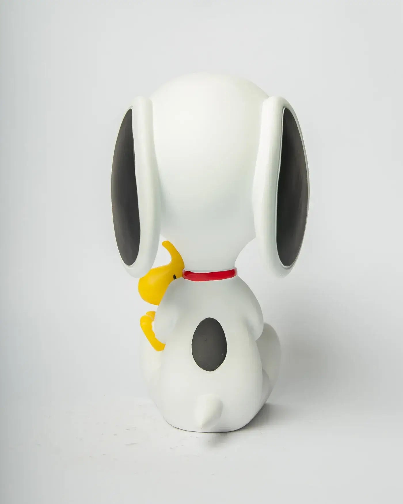 Vue de dos de la figurine Snoopy et Woodstock assis
