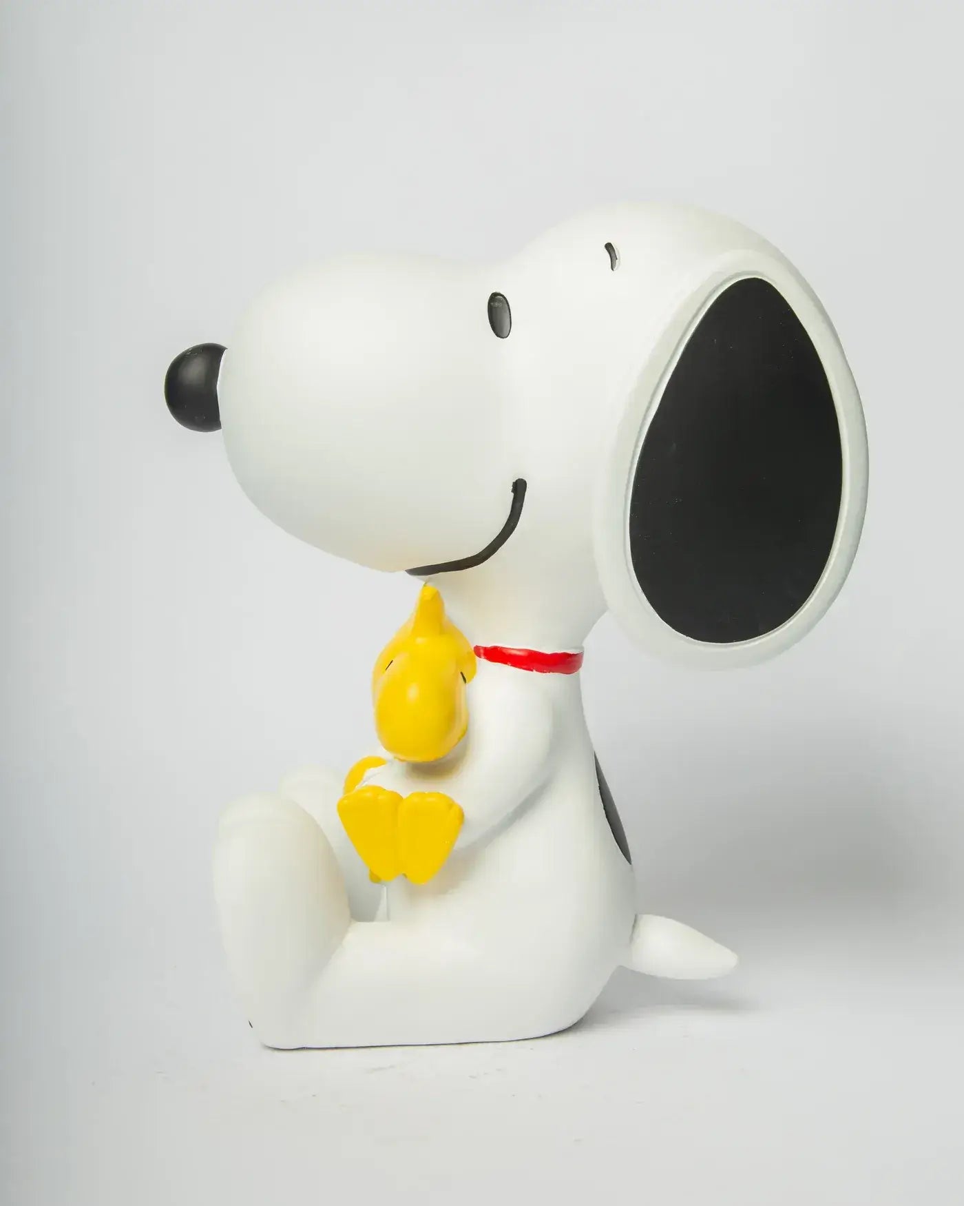 Profli gauche de la figurine Snoopy et Woodstock