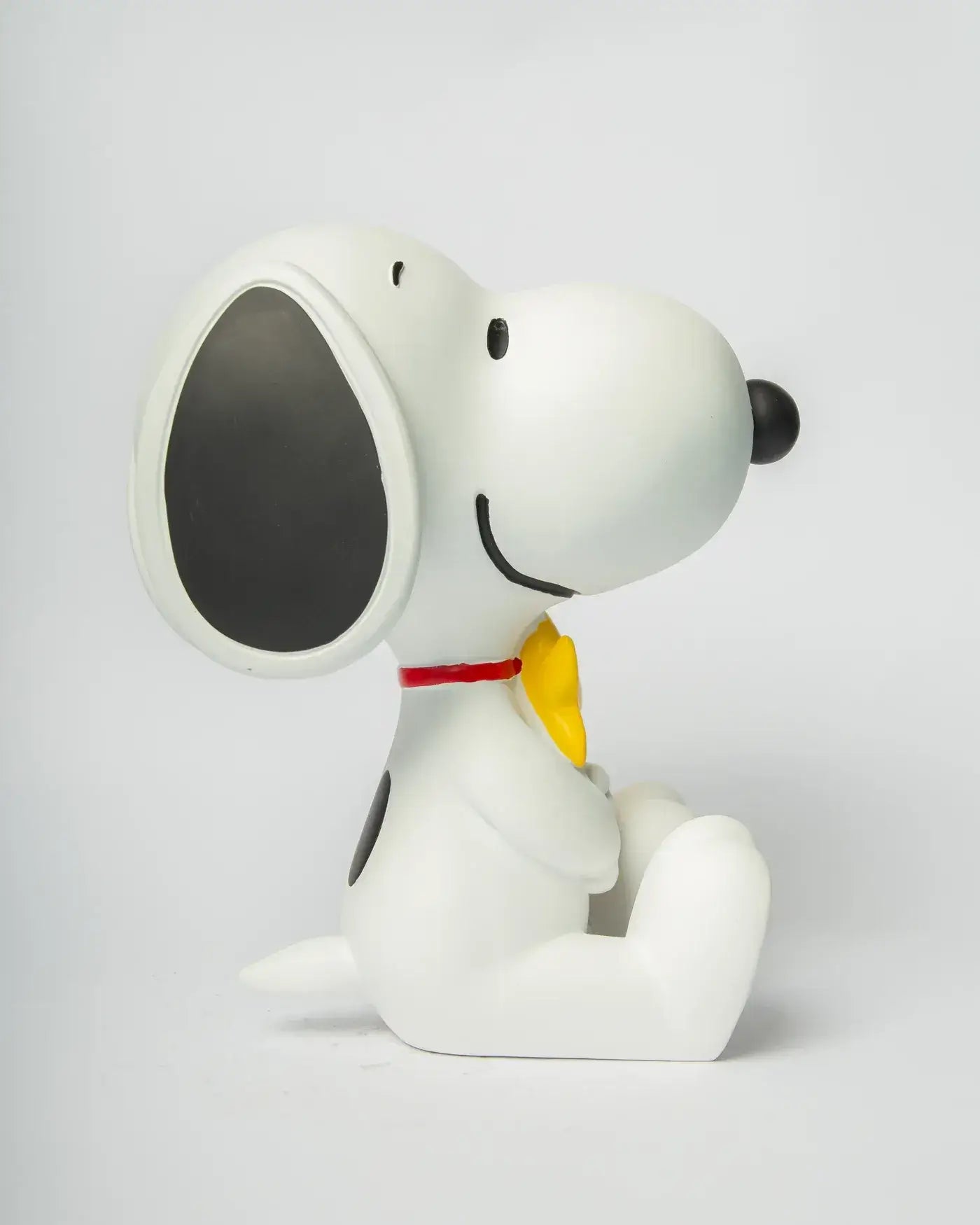 Vue de profli de la figurine Snoopy et Woodstock assis