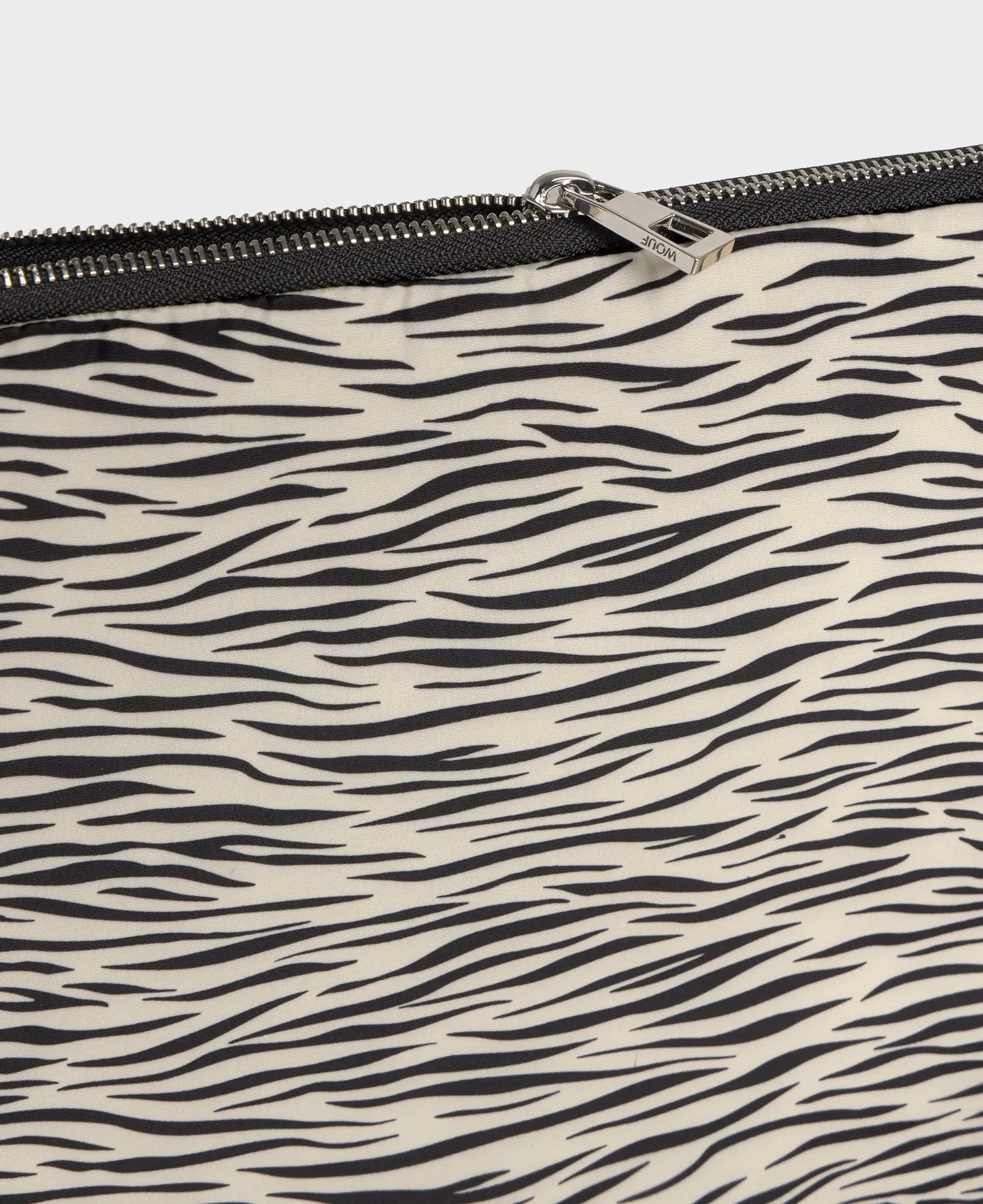 La housse d'ordinateur Wouf Zebra Hit et sa fermeture éclair