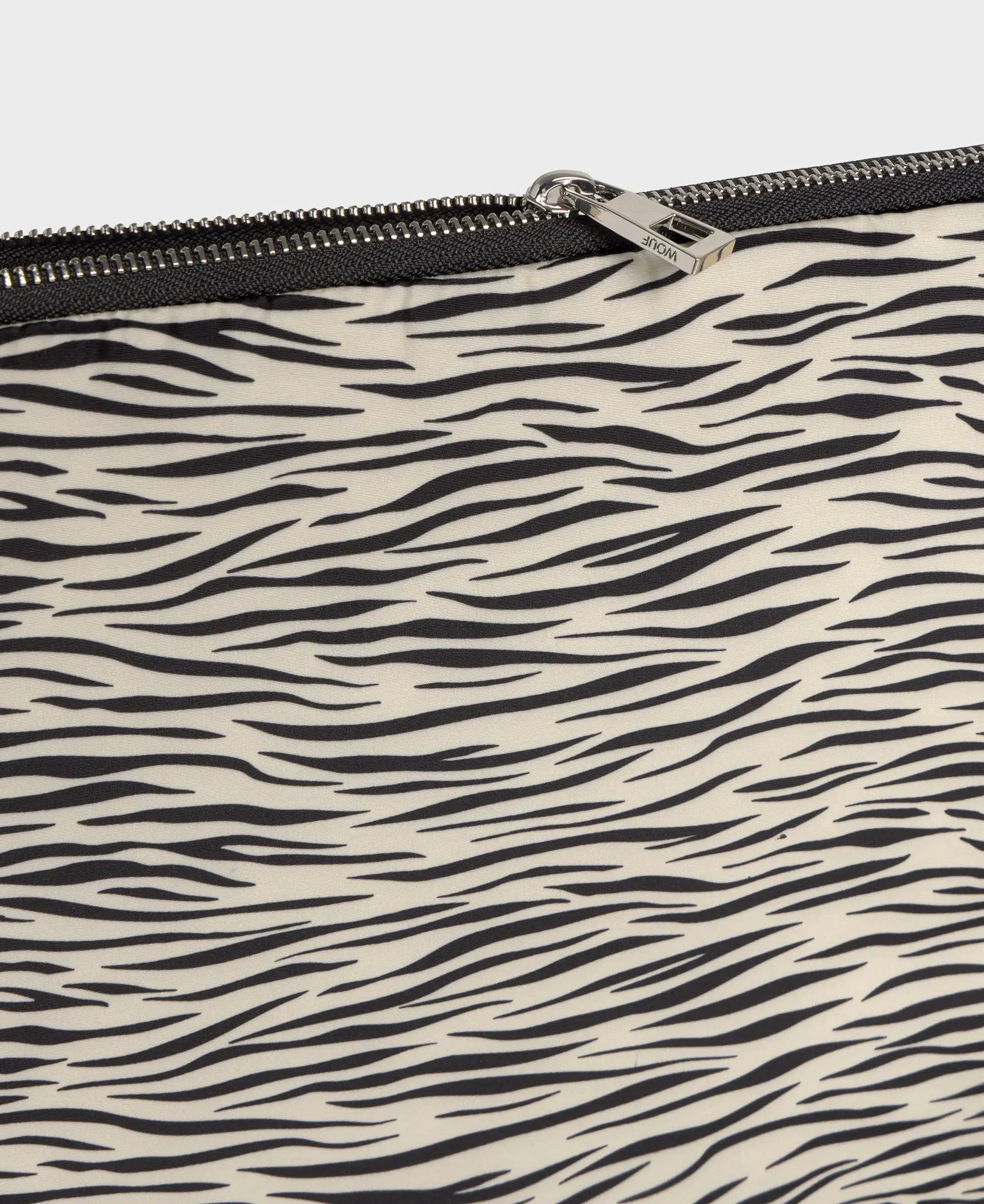 La housse d'ordinateur Wouf Zebra Hit et sa fermeture éclair