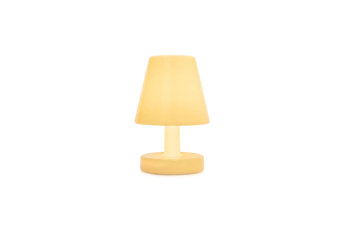 Lampe Edison The Ambiance Pale yellow Fatboy allumée