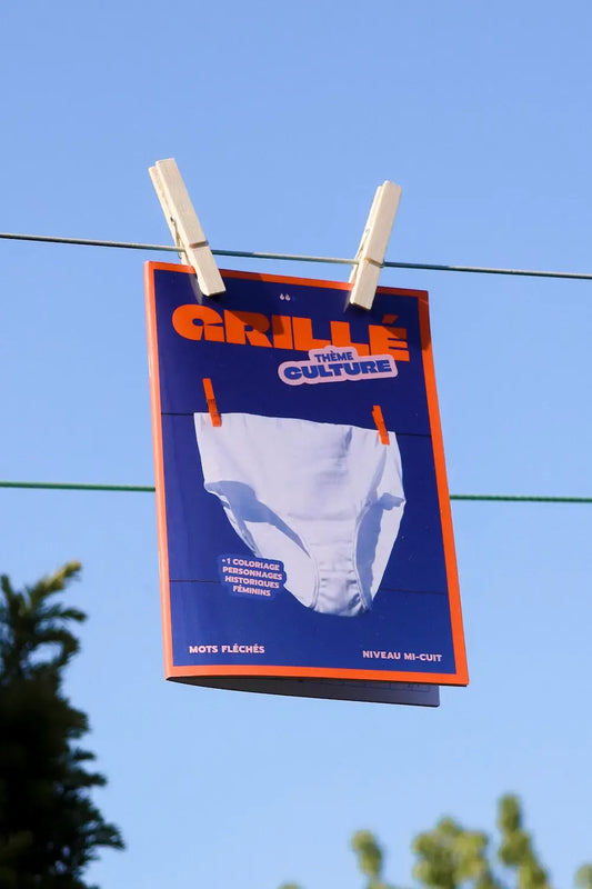 Mots fléchés Grillé « Culture » mis en lumière sur un séchoir