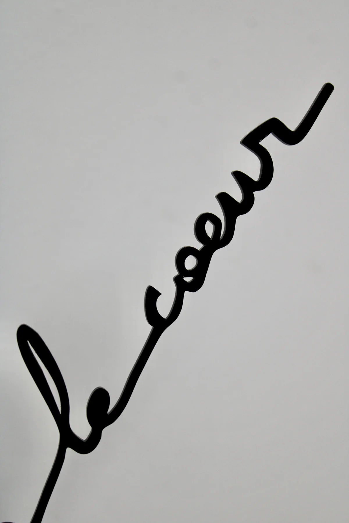 Phrase murale "Le soleil dans le cœur" en plexiglas recyclé finition noir