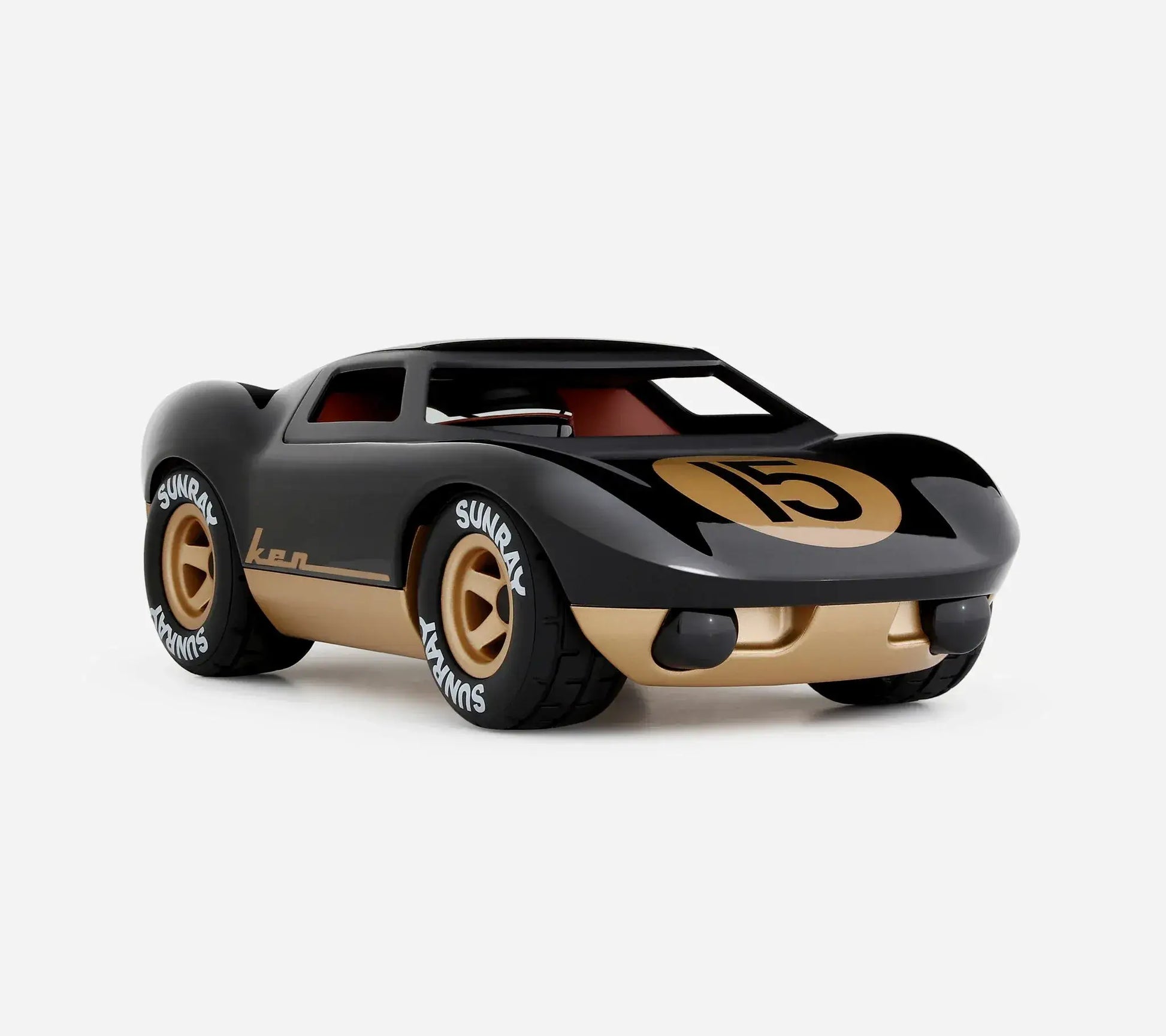 Voiture miniature Playforever Ken Cave noire et or vue de trois quarts