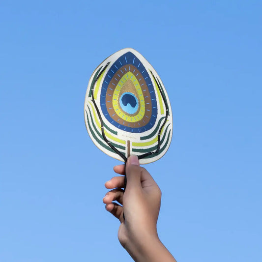 Photo du petit éventail plume de paon de chez Pubumésu