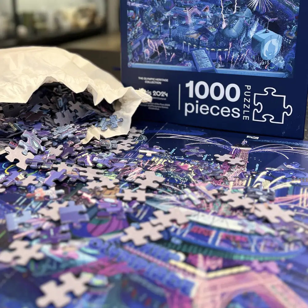 Puzzle 1000 jeux olympiques Paris 2024 étalé sur son illustration