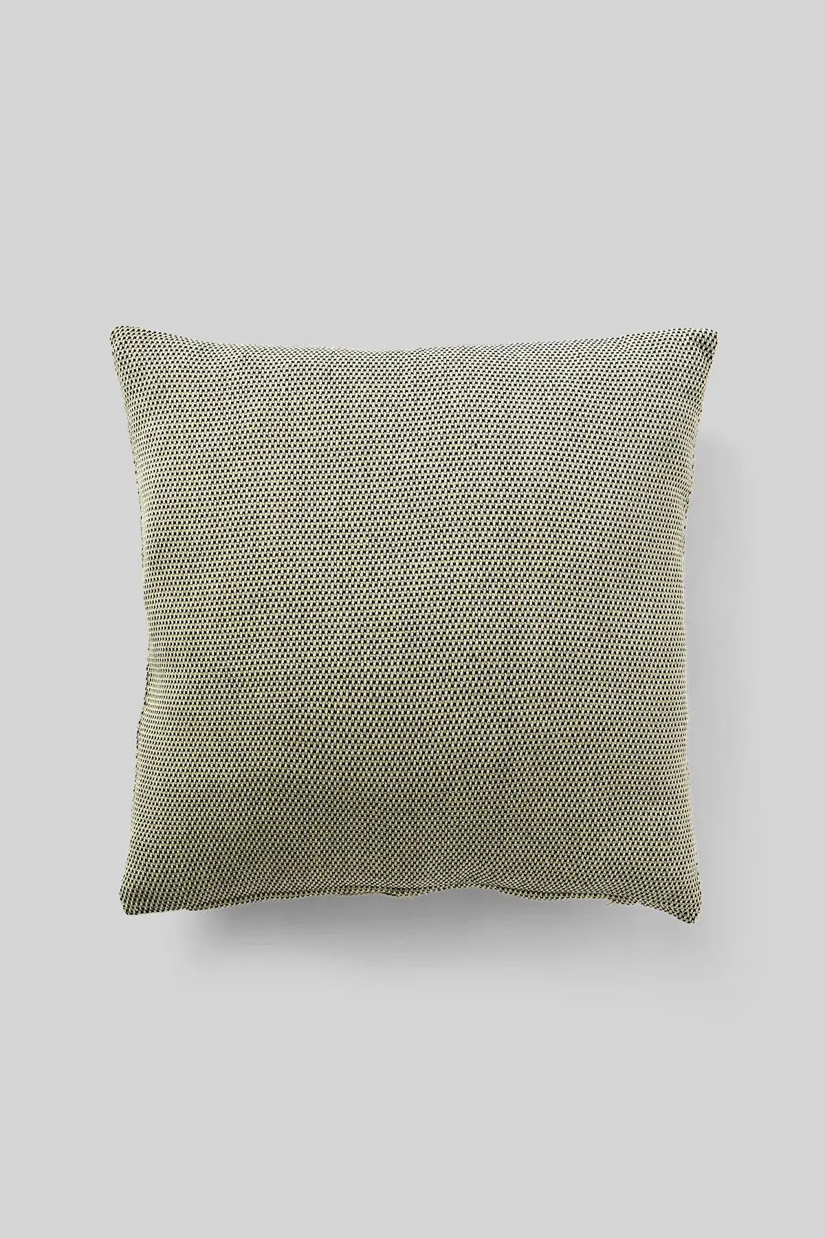 Coussin avec la housse jaune
