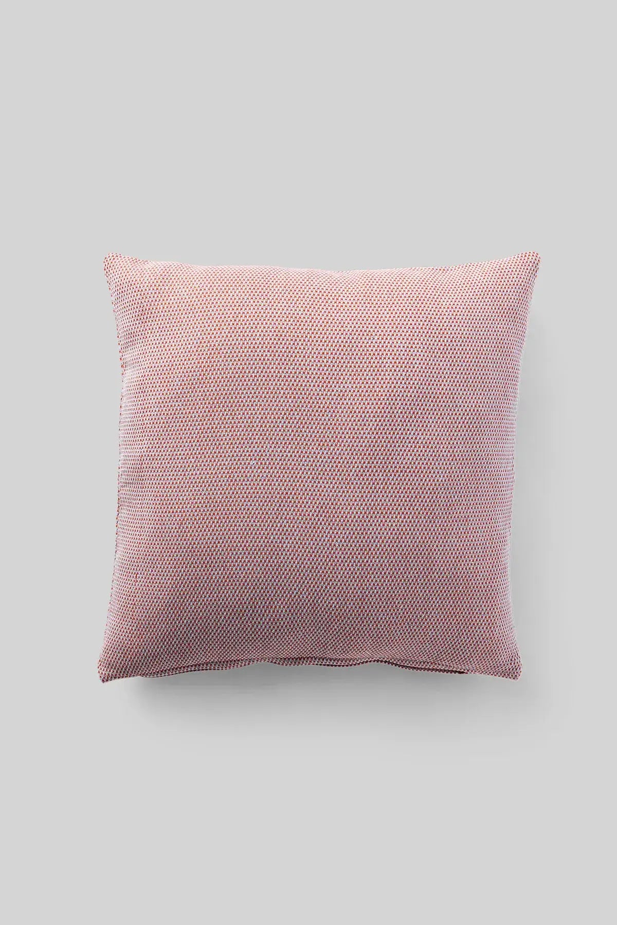 Coussin avec la housse rouge