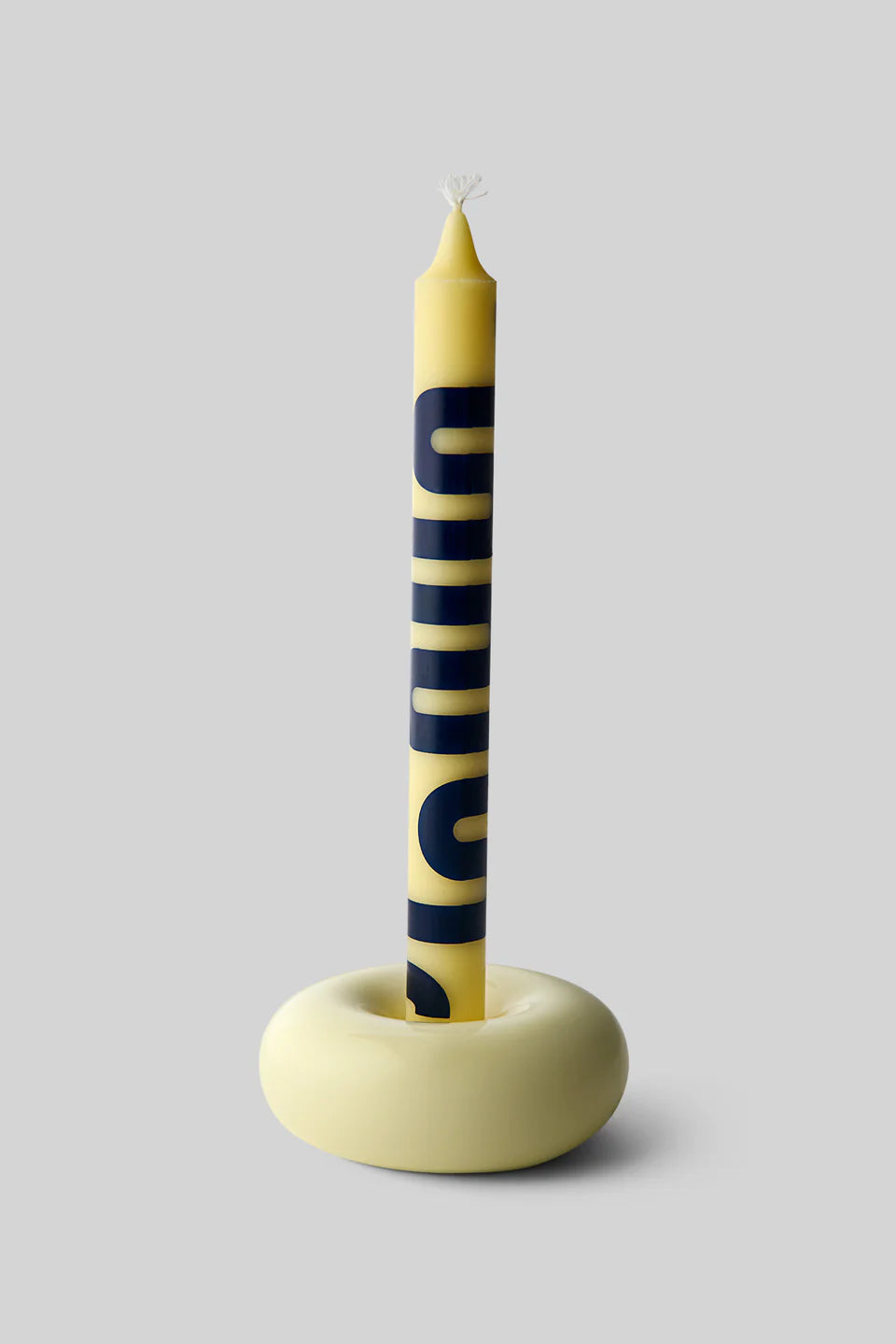 Petit bougeoir Bob jaune avec une bougie bleu et jaune