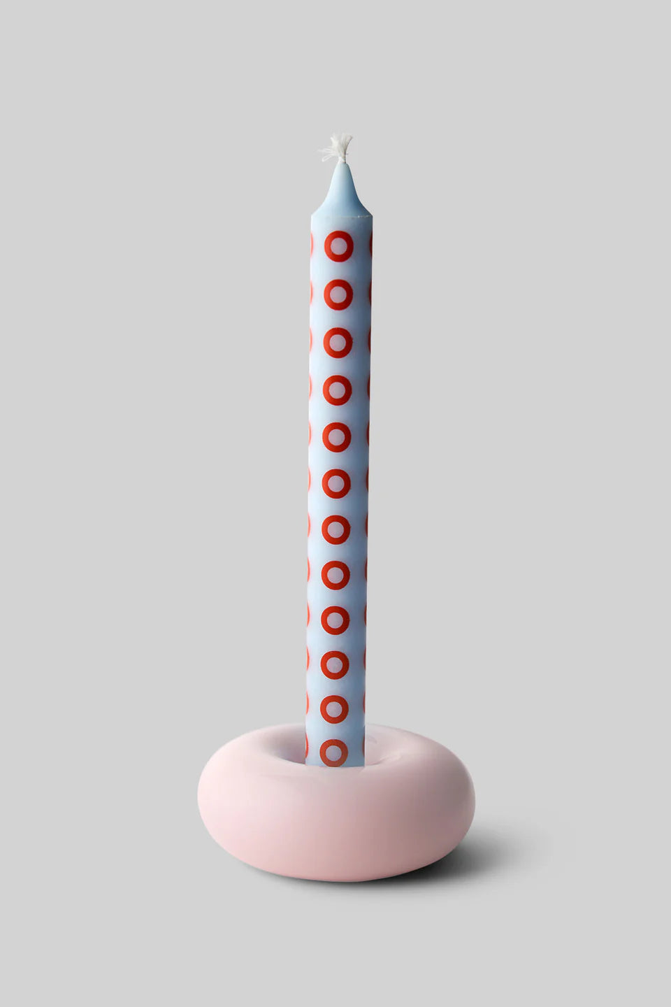 Petit bougeoir Bob rose avec bougie bleue de chez Studio About