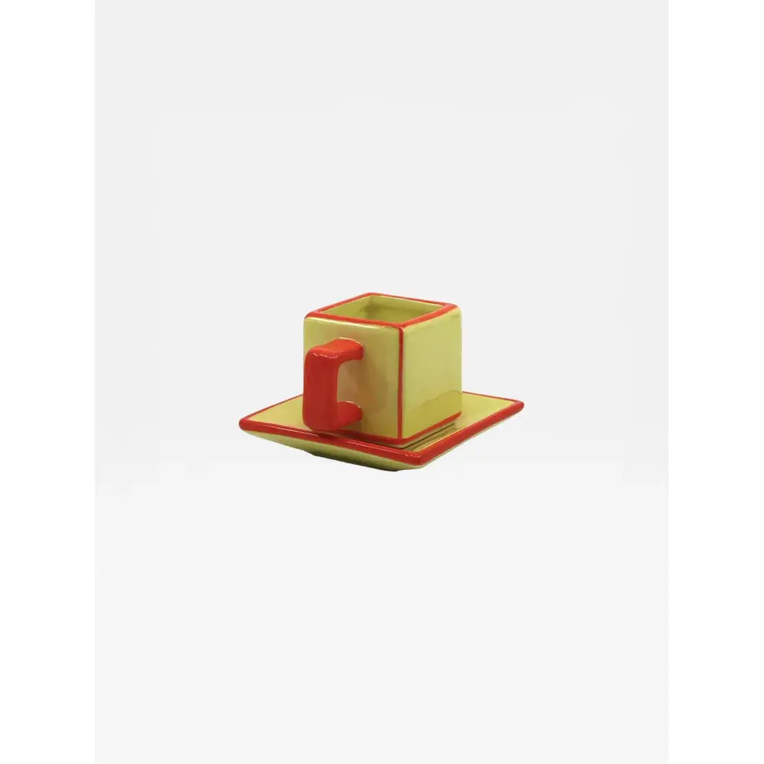 Tasse à café et soucoupe en céramique jaune et orange design graphique Tile vue de trois quart