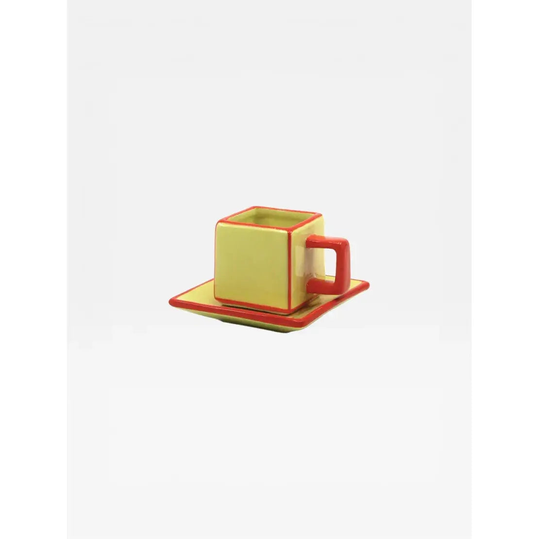 Tasse à café avec soucoupe en céramique jaune et orange design graphique vue de trois quart