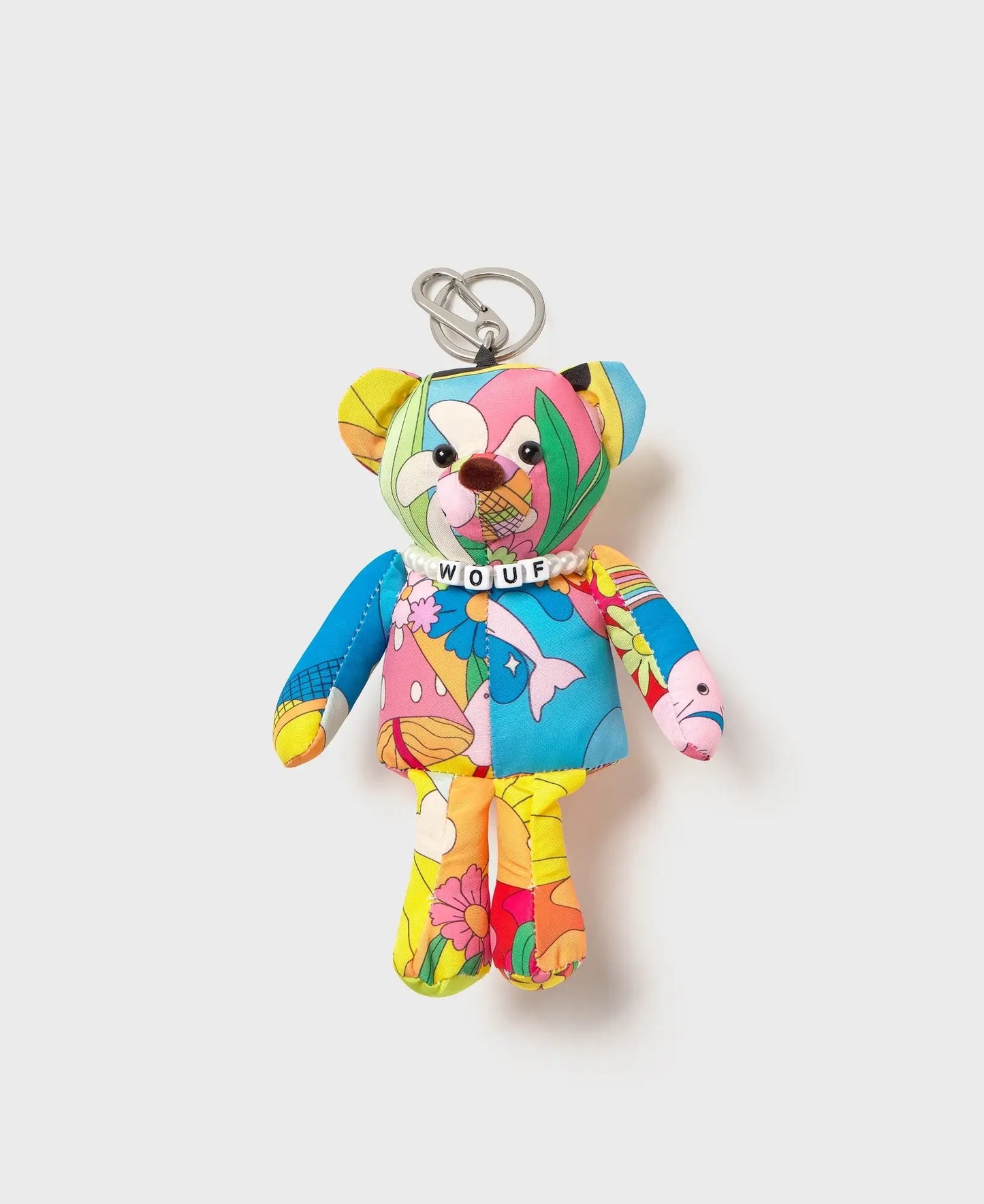Porte-clés Magic Trip Bear Charm de chez Wouf - Ours aux motifs colorés évoquant les voyages et les rêves