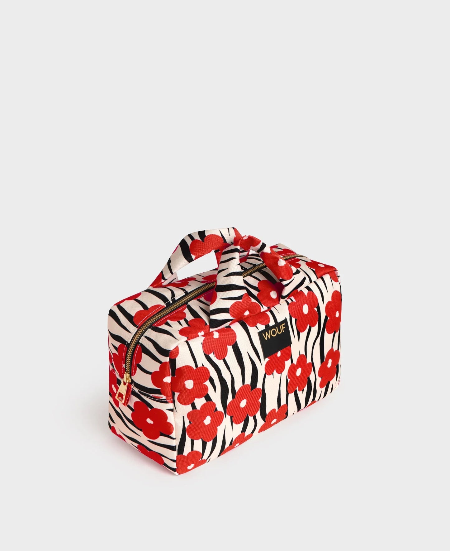 Grande trousse de toilette Wildflower de chez Wouf vue de côté