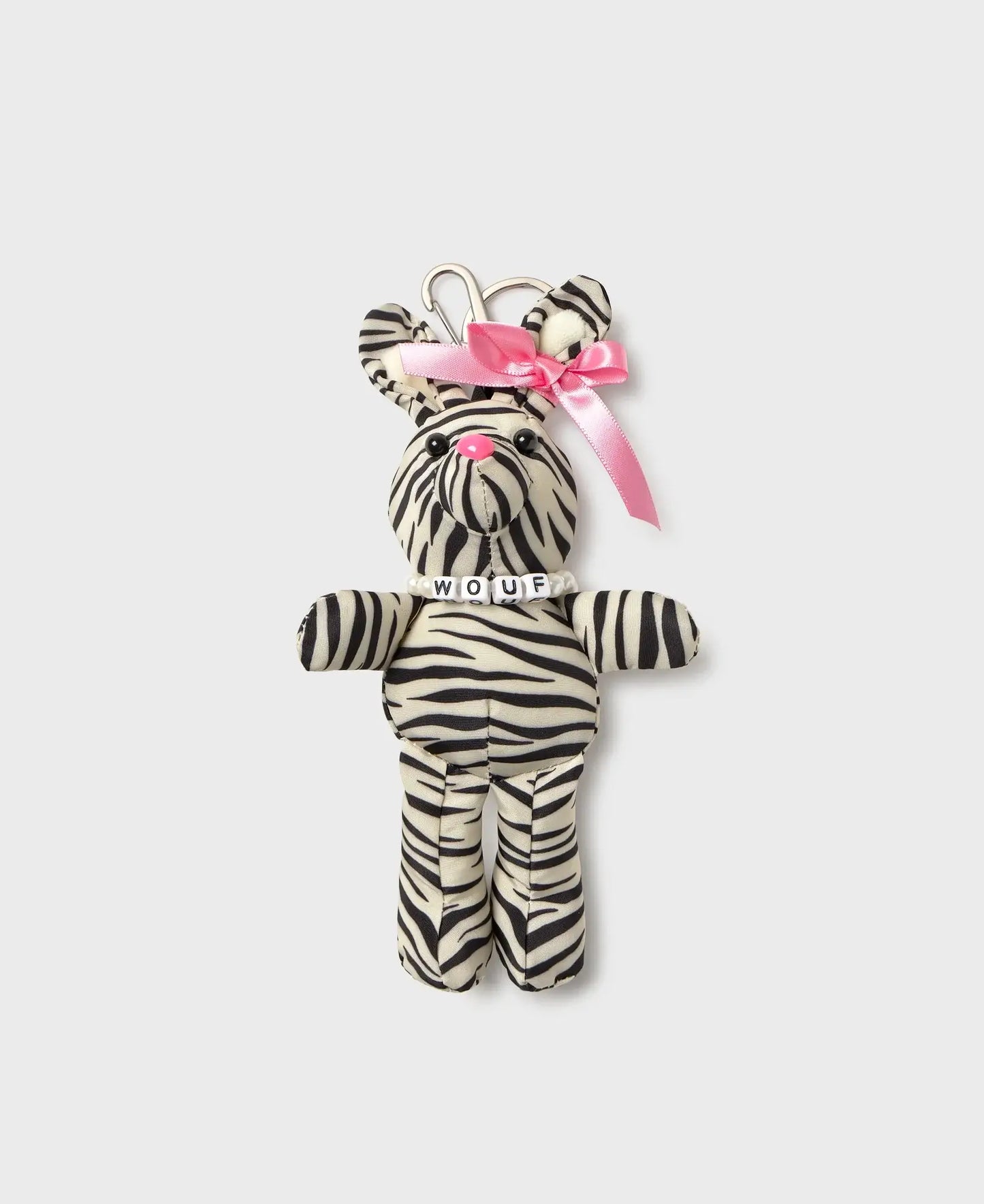 Porte-clés Zebra Hit Rabbit Charm de chez Wouf - Lapin zébré avec ruban rose sur l'oreille