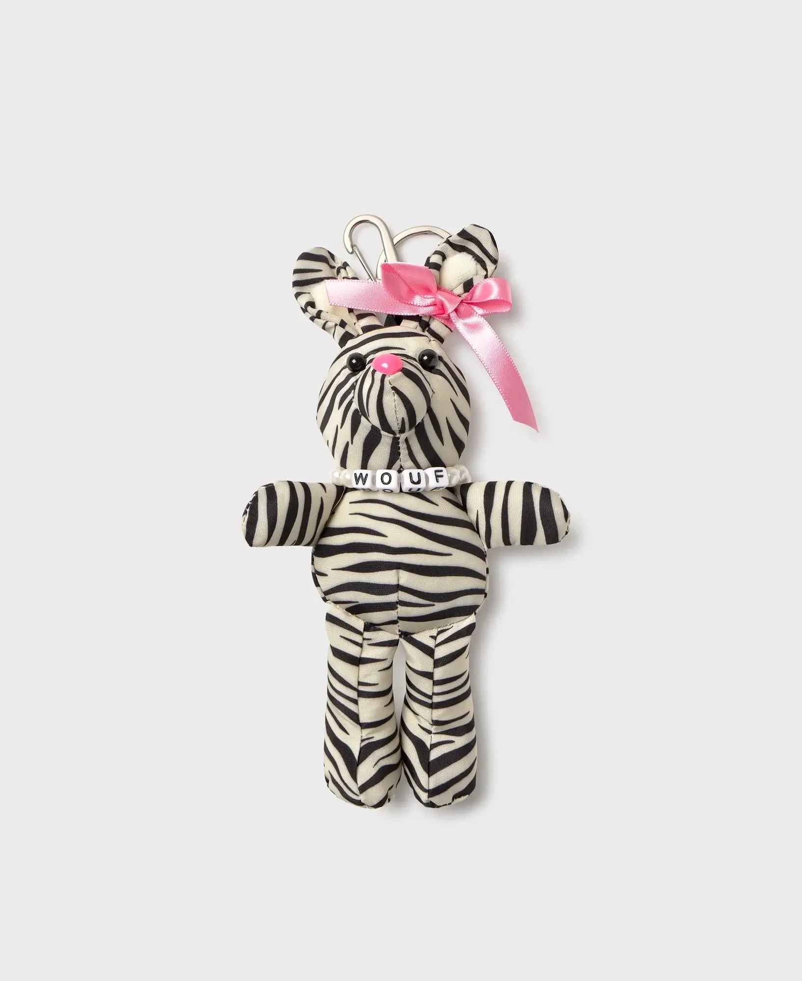 Porte-clés Zebra Hit Rabbit Charm de chez Wouf - Lapin zébré avec ruban rose sur l'oreille